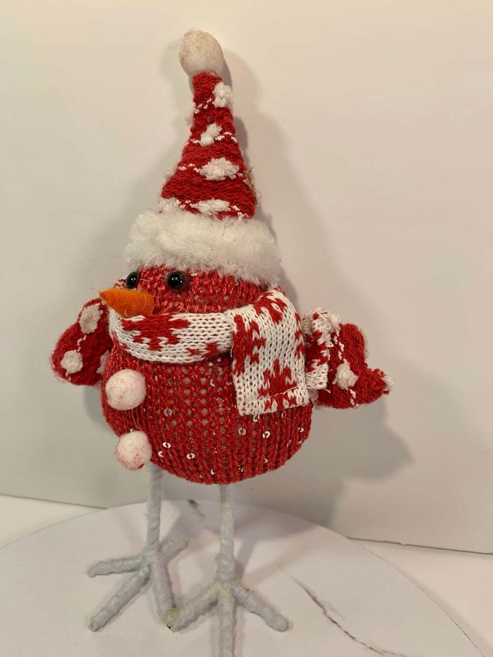 Red knit bird with scarf decoration